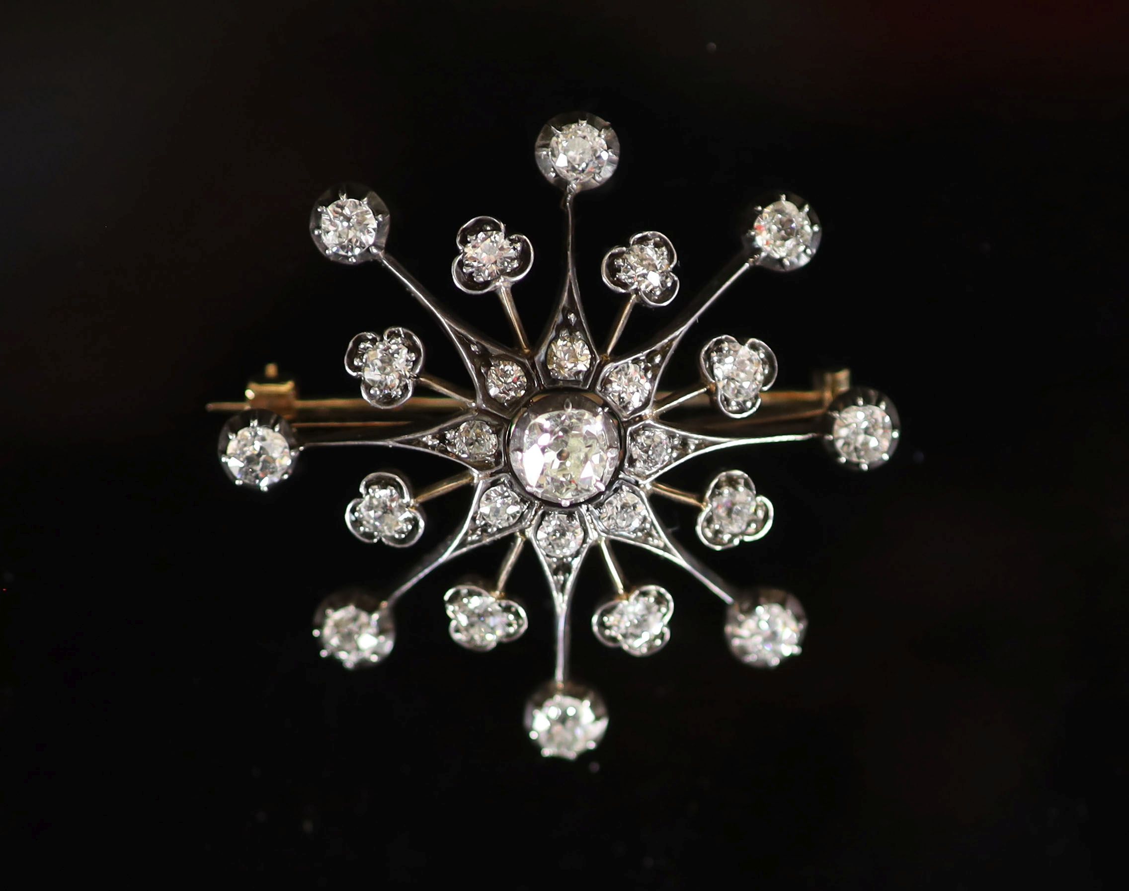 A Victorian, gold, silver and diamond set 'starburst' brooch